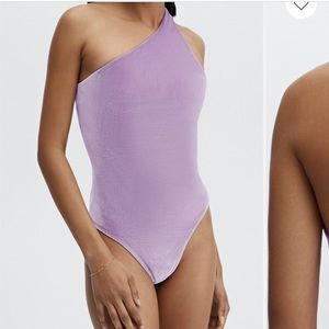 Velour bodysuit in bright lilac! Brand new and still in bag!